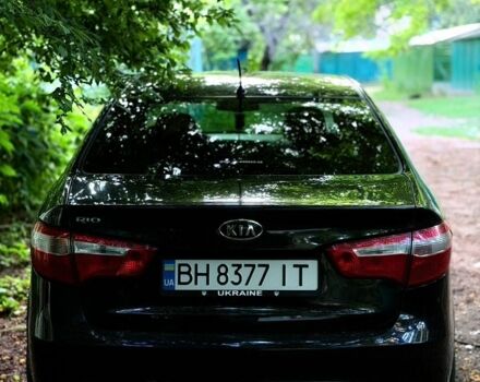 Чорний Кіа Ріо, об'ємом двигуна 1.6 л та пробігом 104 тис. км за 8500 $, фото 11 на Automoto.ua