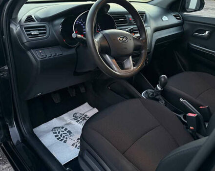 Чорний Кіа Ріо, об'ємом двигуна 1.4 л та пробігом 136 тис. км за 6900 $, фото 10 на Automoto.ua