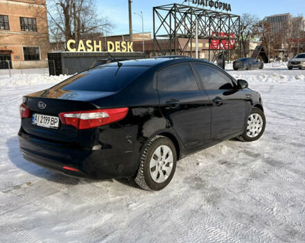 Черный Киа Рио, объемом двигателя 1.6 л и пробегом 270 тыс. км за 6650 $, фото 3 на Automoto.ua