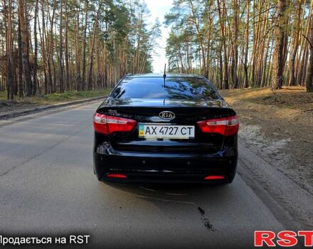 Черный Киа Рио, объемом двигателя 1.6 л и пробегом 103 тыс. км за 6800 $, фото 4 на Automoto.ua