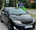 Чорний Кіа Ріо, об'ємом двигуна 1.6 л та пробігом 180 тис. км за 7200 $, фото 1 на Automoto.ua