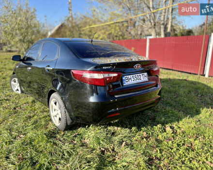 Чорний Кіа Ріо, об'ємом двигуна 1.4 л та пробігом 183 тис. км за 6500 $, фото 2 на Automoto.ua