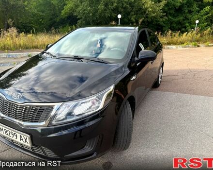 Чорний Кіа Ріо, об'ємом двигуна 1.4 л та пробігом 74 тис. км за 9100 $, фото 2 на Automoto.ua