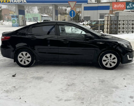 Черный Киа Рио, объемом двигателя 1.4 л и пробегом 155 тыс. км за 7500 $, фото 5 на Automoto.ua