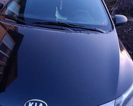 Чорний Кіа Ріо, об'ємом двигуна 1.4 л та пробігом 162 тис. км за 7500 $, фото 4 на Automoto.ua