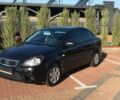 Черный Киа Рио, объемом двигателя 1.4 л и пробегом 189 тыс. км за 7700 $, фото 1 на Automoto.ua