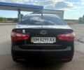 Черный Киа Рио, объемом двигателя 1.4 л и пробегом 74 тыс. км за 9100 $, фото 1 на Automoto.ua