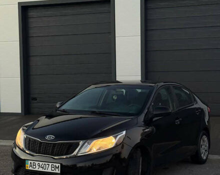 Чорний Кіа Ріо, об'ємом двигуна 1.4 л та пробігом 136 тис. км за 6900 $, фото 2 на Automoto.ua