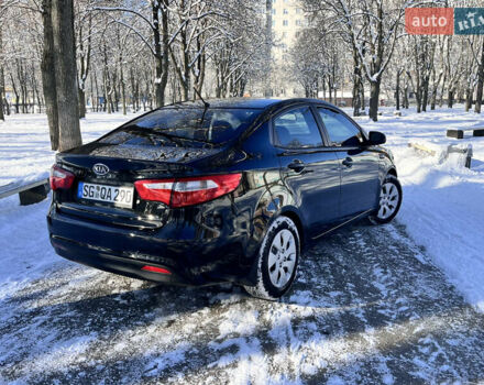 Чорний Кіа Ріо, об'ємом двигуна 1.4 л та пробігом 245 тис. км за 7600 $, фото 12 на Automoto.ua
