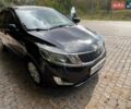 Черный Киа Рио, объемом двигателя 1.59 л и пробегом 160 тыс. км за 8100 $, фото 1 на Automoto.ua