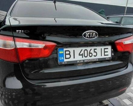 Черный Киа Рио, объемом двигателя 1.4 л и пробегом 100 тыс. км за 7607 $, фото 1 на Automoto.ua