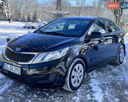 Чорний Кіа Ріо, об'ємом двигуна 1.4 л та пробігом 245 тис. км за 7600 $, фото 5 на Automoto.ua