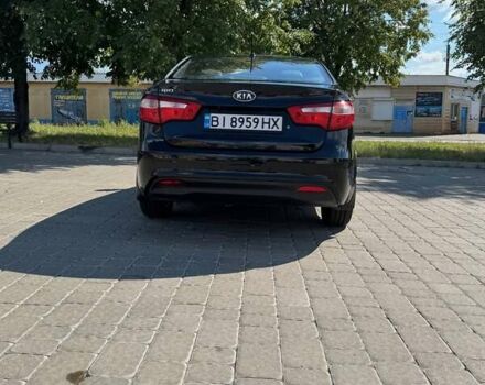 Чорний Кіа Ріо, об'ємом двигуна 1.4 л та пробігом 158 тис. км за 8300 $, фото 4 на Automoto.ua