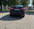 Чорний Кіа Ріо, об'ємом двигуна 1.4 л та пробігом 158 тис. км за 8300 $, фото 4 на Automoto.ua