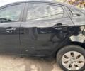 Чорний Кіа Ріо, об'ємом двигуна 1.4 л та пробігом 230 тис. км за 5000 $, фото 7 на Automoto.ua