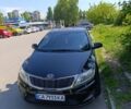 Чорний Кіа Ріо, об'ємом двигуна 1.4 л та пробігом 162 тис. км за 7500 $, фото 2 на Automoto.ua