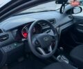 Чорний Кіа Ріо, об'ємом двигуна 1.4 л та пробігом 201 тис. км за 6950 $, фото 19 на Automoto.ua