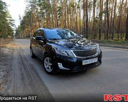 Черный Киа Рио, объемом двигателя 1.6 л и пробегом 103 тыс. км за 6800 $, фото 2 на Automoto.ua