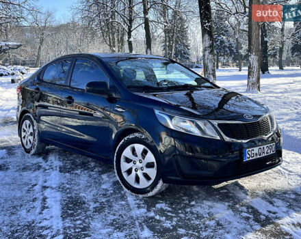 Чорний Кіа Ріо, об'ємом двигуна 1.4 л та пробігом 245 тис. км за 7600 $, фото 1 на Automoto.ua