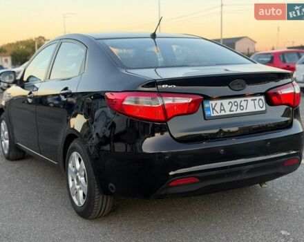Черный Киа Рио, объемом двигателя 1.4 л и пробегом 201 тыс. км за 6900 $, фото 2 на Automoto.ua