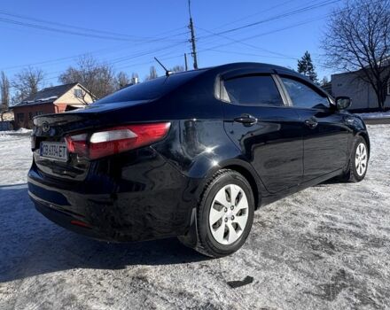 Чорний Кіа Ріо, об'ємом двигуна 1.4 л та пробігом 160 тис. км за 7700 $, фото 3 на Automoto.ua