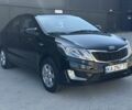 Чорний Кіа Ріо, об'ємом двигуна 1.4 л та пробігом 201 тис. км за 6948 $, фото 6 на Automoto.ua