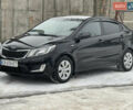 Черный Киа Рио, объемом двигателя 1.4 л и пробегом 155 тыс. км за 7500 $, фото 1 на Automoto.ua