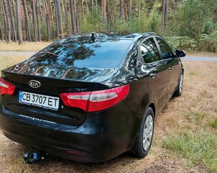 Чорний Кіа Ріо, об'ємом двигуна 0 л та пробігом 125 тис. км за 7099 $, фото 1 на Automoto.ua