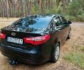 Чорний Кіа Ріо, об'ємом двигуна 0 л та пробігом 125 тис. км за 7099 $, фото 1 на Automoto.ua