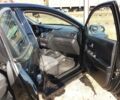 Чорний Кіа Ріо, об'ємом двигуна 1.4 л та пробігом 77 тис. км за 8500 $, фото 5 на Automoto.ua
