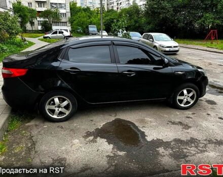 Черный Киа Рио, объемом двигателя 1.6 л и пробегом 330 тыс. км за 5700 $, фото 2 на Automoto.ua