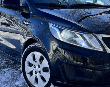 Чорний Кіа Ріо, об'ємом двигуна 1.4 л та пробігом 245 тис. км за 7600 $, фото 6 на Automoto.ua