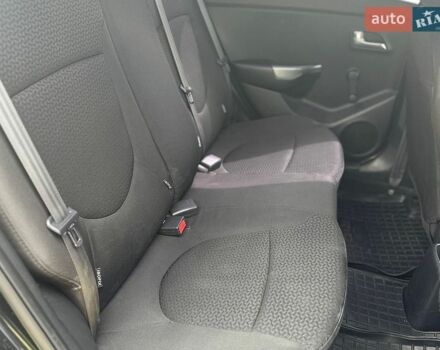 Черный Киа Рио, объемом двигателя 1.4 л и пробегом 108 тыс. км за 7950 $, фото 19 на Automoto.ua