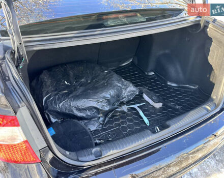 Чорний Кіа Ріо, об'ємом двигуна 1.4 л та пробігом 245 тис. км за 7600 $, фото 28 на Automoto.ua