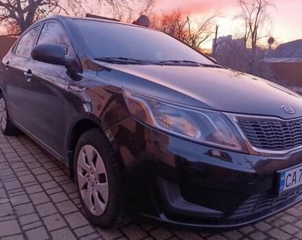 Чорний Кіа Ріо, об'ємом двигуна 1.4 л та пробігом 162 тис. км за 7500 $, фото 5 на Automoto.ua