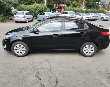 Чорний Кіа Ріо, об'ємом двигуна 1.4 л та пробігом 123 тис. км за 7600 $, фото 2 на Automoto.ua
