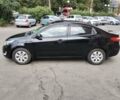 Чорний Кіа Ріо, об'ємом двигуна 1.4 л та пробігом 123 тис. км за 7600 $, фото 2 на Automoto.ua