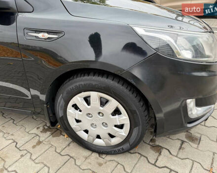 Чорний Кіа Ріо, об'ємом двигуна 1.6 л та пробігом 392 тис. км за 4500 $, фото 15 на Automoto.ua