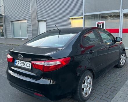 Черный Киа Рио, объемом двигателя 1.4 л и пробегом 190 тыс. км за 6600 $, фото 4 на Automoto.ua