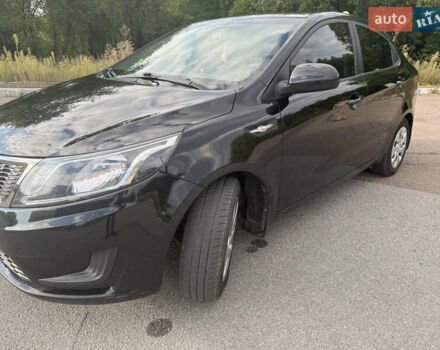 Черный Киа Рио, объемом двигателя 1.4 л и пробегом 74 тыс. км за 8900 $, фото 1 на Automoto.ua