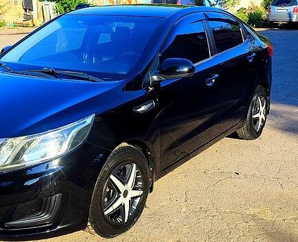 Черный Киа Рио, объемом двигателя 1.4 л и пробегом 120 тыс. км за 7700 $, фото 6 на Automoto.ua