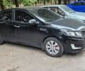 Черный Киа Рио, объемом двигателя 1.59 л и пробегом 127 тыс. км за 8800 $, фото 1 на Automoto.ua