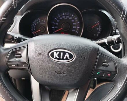 Чорний Кіа Ріо, об'ємом двигуна 1.4 л та пробігом 123 тис. км за 7600 $, фото 7 на Automoto.ua