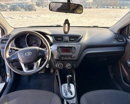 Чорний Кіа Ріо, об'ємом двигуна 1.6 л та пробігом 270 тис. км за 6499 $, фото 10 на Automoto.ua