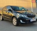 Черный Киа Рио, объемом двигателя 1.6 л и пробегом 181 тыс. км за 7950 $, фото 1 на Automoto.ua