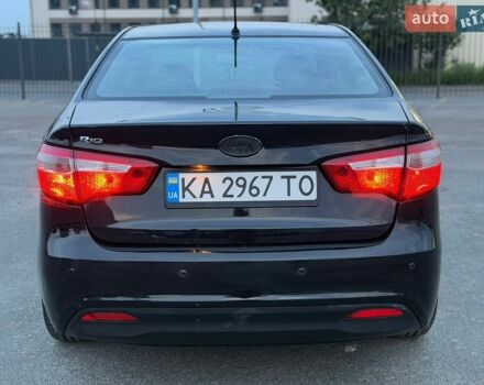 Чорний Кіа Ріо, об'ємом двигуна 1.4 л та пробігом 201 тис. км за 6950 $, фото 3 на Automoto.ua