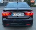 Чорний Кіа Ріо, об'ємом двигуна 1.4 л та пробігом 201 тис. км за 6950 $, фото 3 на Automoto.ua