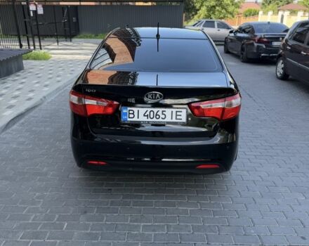 Чорний Кіа Ріо, об'ємом двигуна 1.4 л та пробігом 103 тис. км за 7999 $, фото 4 на Automoto.ua