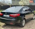 Черный Киа Рио, объемом двигателя 1.4 л и пробегом 108 тыс. км за 7950 $, фото 3 на Automoto.ua
