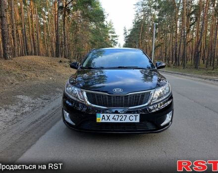 Черный Киа Рио, объемом двигателя 1.6 л и пробегом 103 тыс. км за 6800 $, фото 1 на Automoto.ua